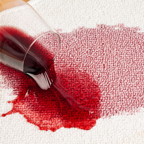 Nettoyage de tache de vin sur tapis résidentiel